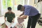 Thi hành lệnh khám xét nơi ở, bắt tạm giam cán bộ thuế Đào Thị Ngân SN 1972