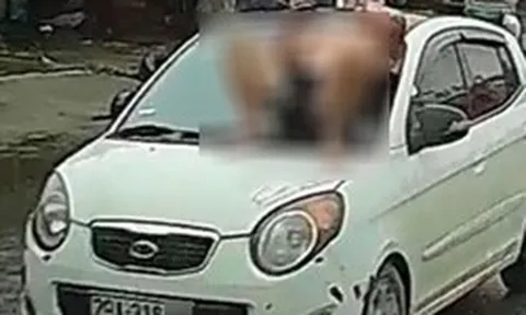 Bất ngờ lý do người đàn ông nằm trên capo ô tô đang chạy giữa phố Hà Nội