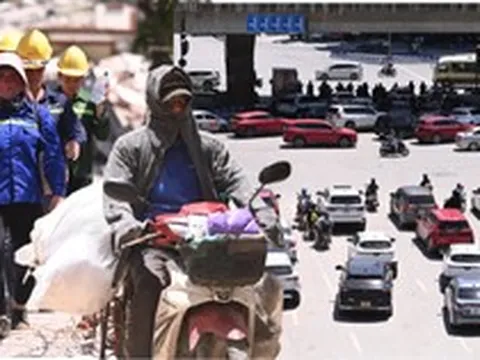 Hà Nội ghi nhận mức nhiệt cao nhất cả nước: Trung tâm Thủ đô nóng ngột ngạt khó thở, người dân vật vã giữa “chảo lửa” 38,7 độ C